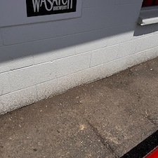 Retail Building Cleaned Using Drone Pressure Washing in Maumelle, AR 0